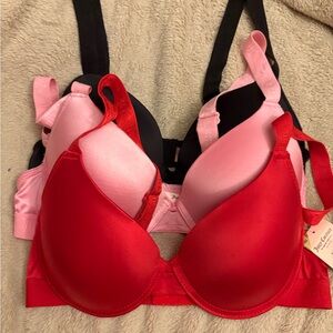 Juicy couture 3 pc bra set (pink,red,black)